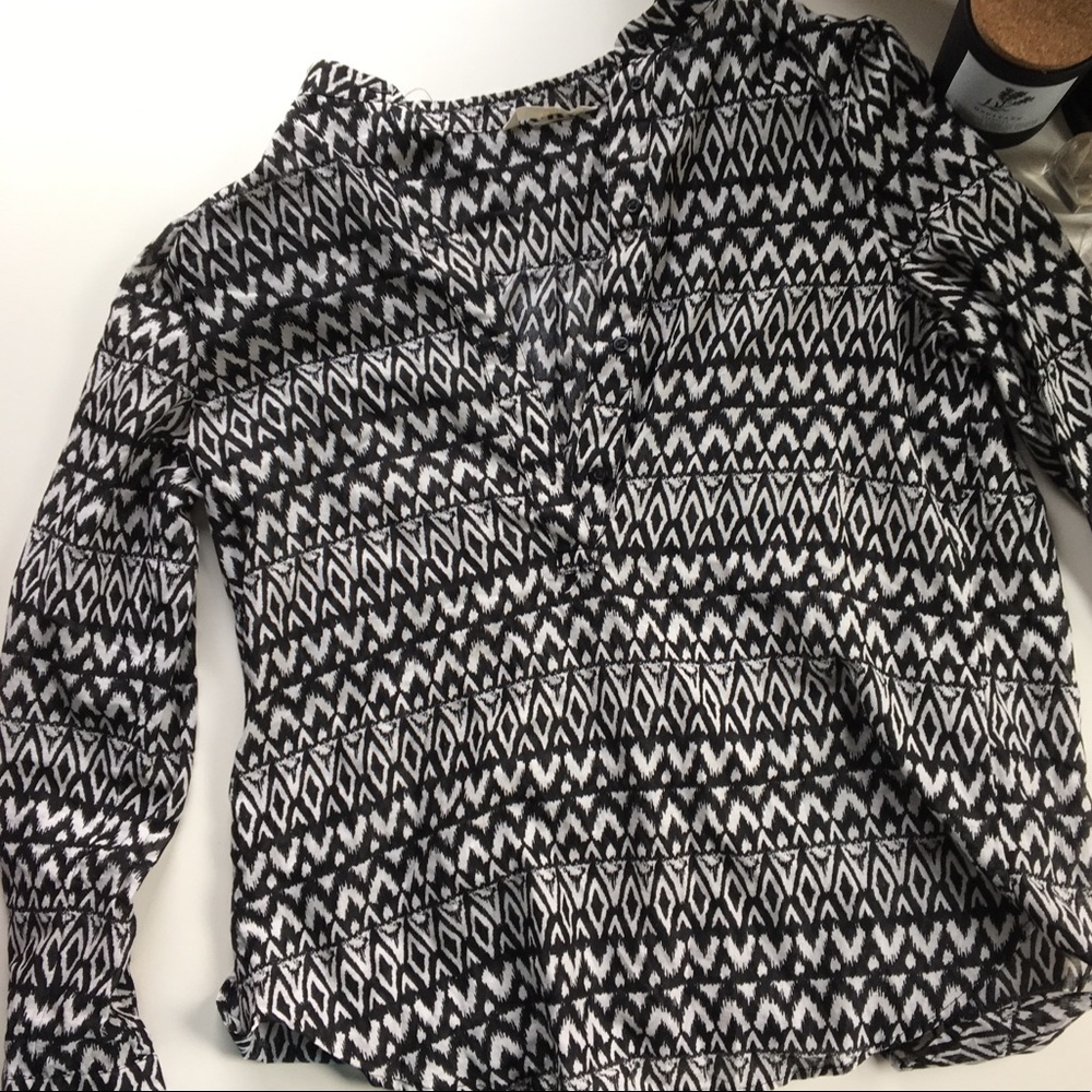 black and white patterned blouse